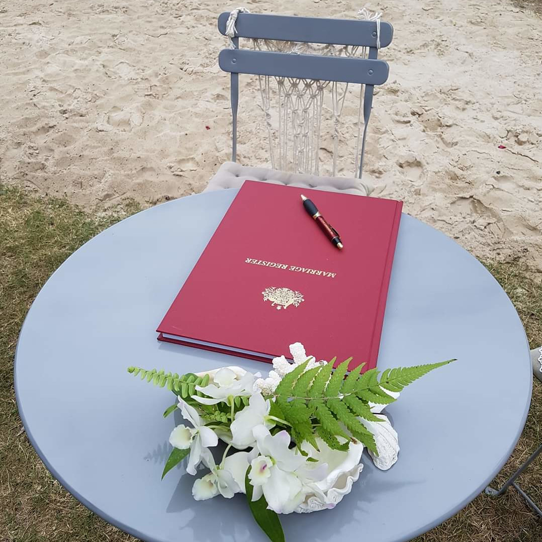 Gold Coast wedding ceremony officiated by Lauren Moore on the beach at sunset