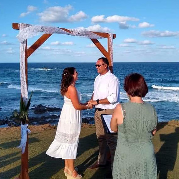 Joyful bride and groom celebrating right after their Gold Coast wedding