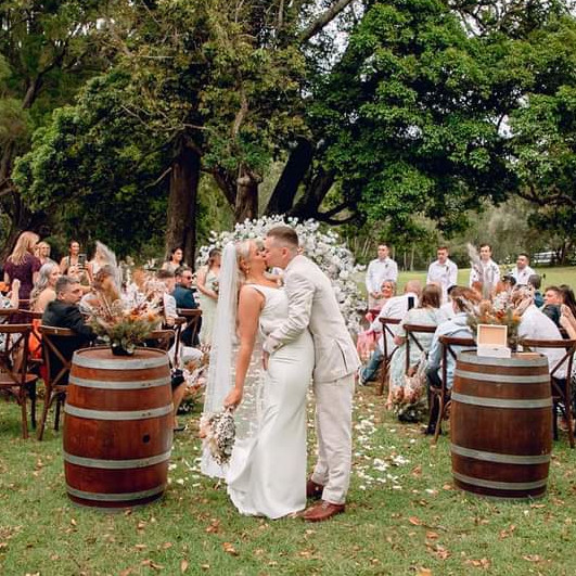 Couple during a Gold Coast wedding ceremony with celebrant Lauren Moore