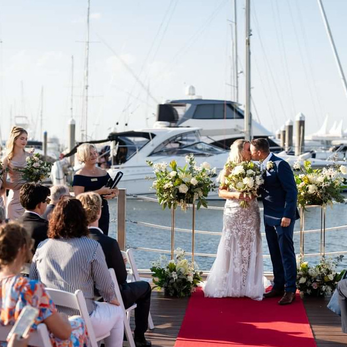 Large wedding party gathered at a stunning Gold Coast waterfront venue